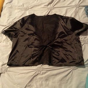 Black silk like top that ties in front
